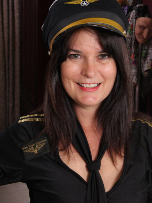 Captain Sherry Lee is getting ready to Takeoff Her Clothing